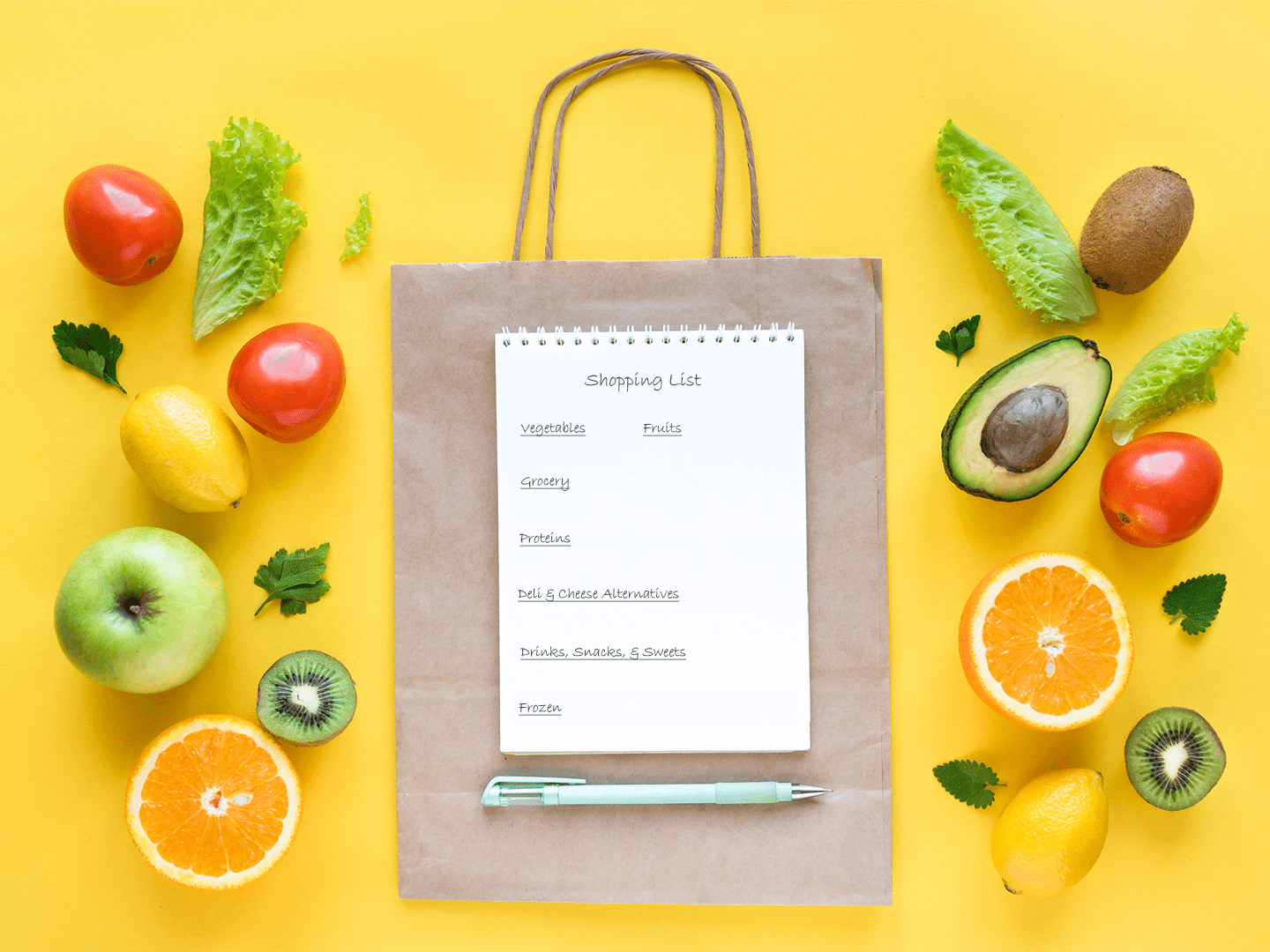Grocery shopping list with produce surrounding.