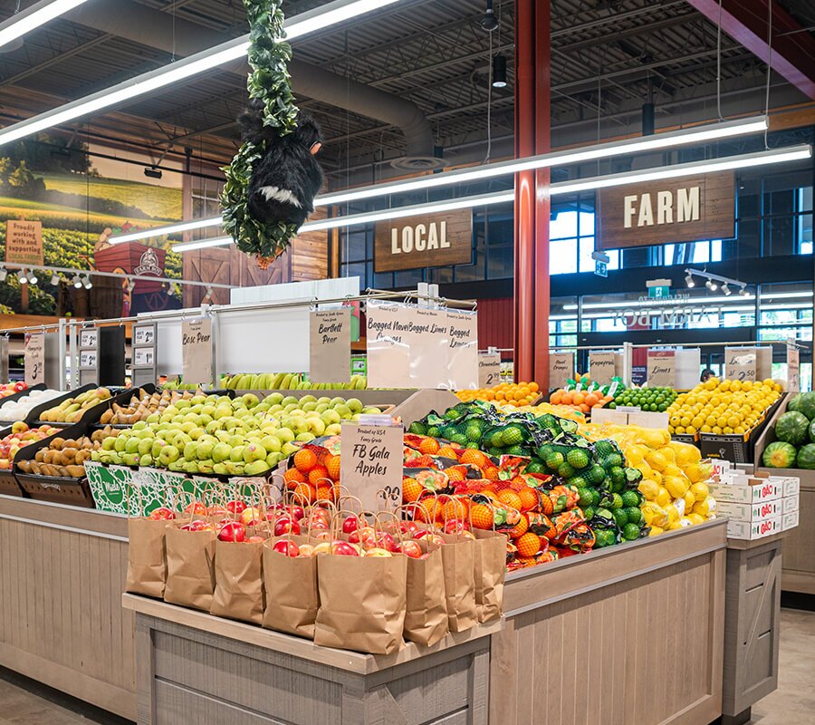 Farm Boy Bronte Fresh Produce section with mikey the money hanging over.