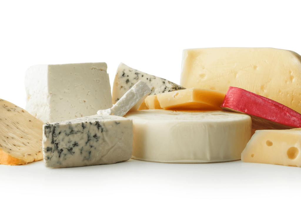 assorted cheeses on white background