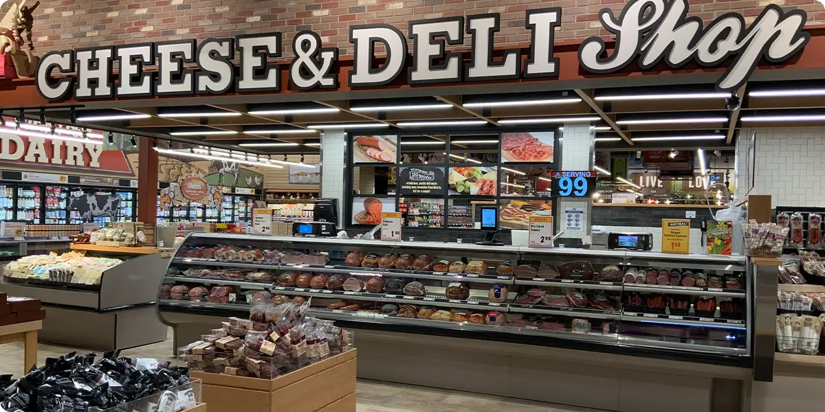 A sign for a cheese and deli shop inside a Farm Boy grocery store in Toronto., a Canadian grocery chain.