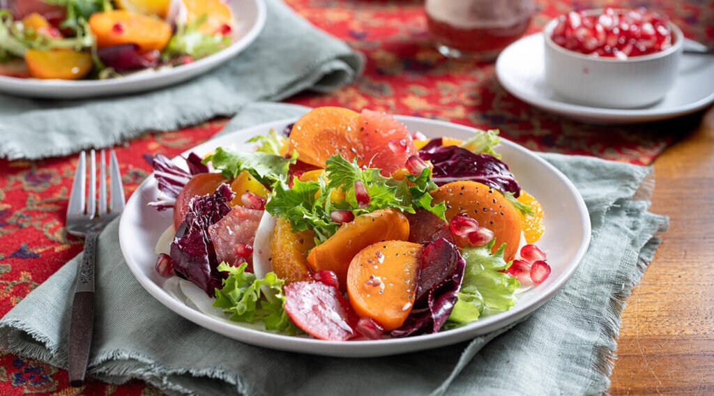 Elevate your table with our Persimmon, Beet, and Radicchio Salad! Featuring roasted beets, juicy citrus, crisp greens, and Farm Boy™ Red Wine Vinaigrette, it's a vibrant, flavour-packed dish perfect for any occasion.