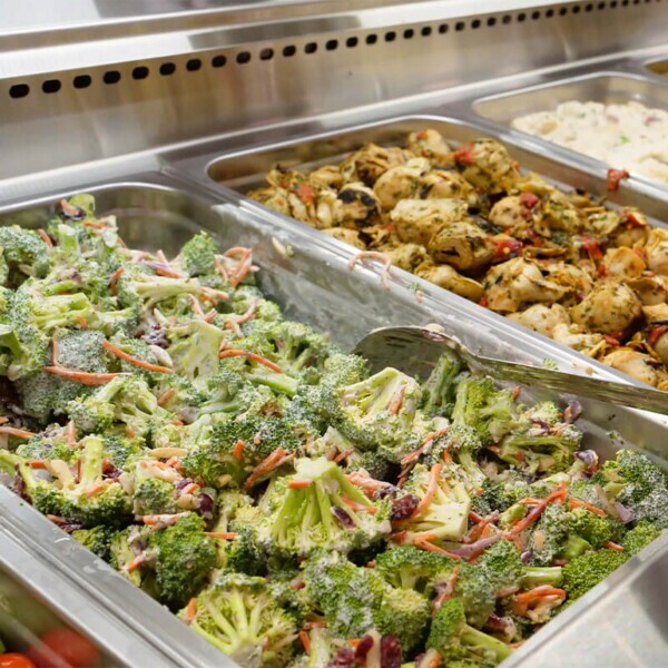 Fresh salad bar inside Farm Boy Walkers Line. Ready to eat, paid by weight.