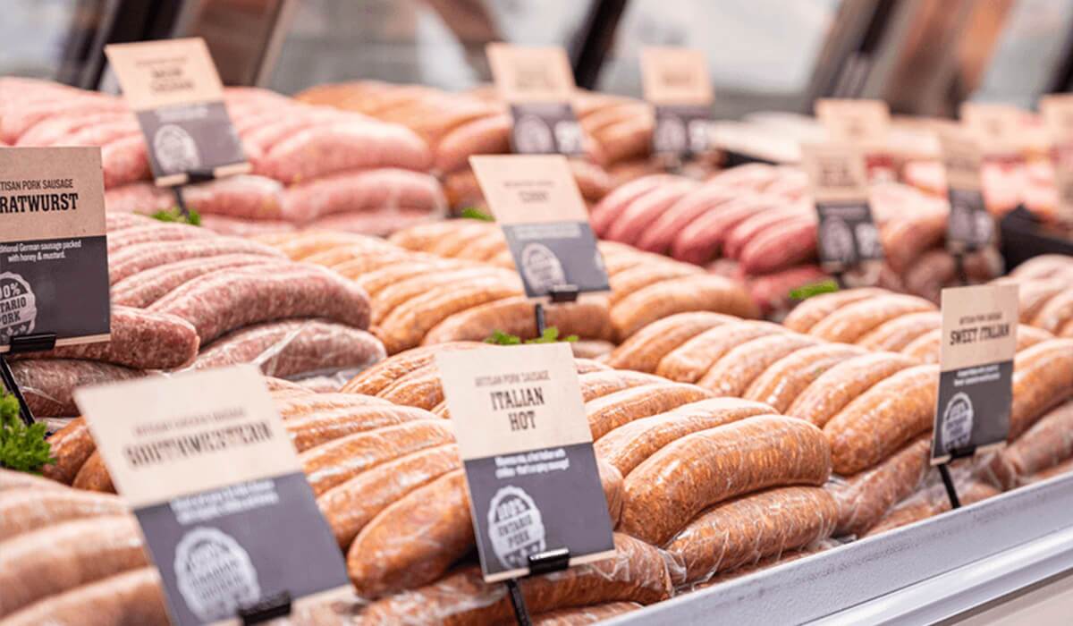 artisan sausage selection butcher case