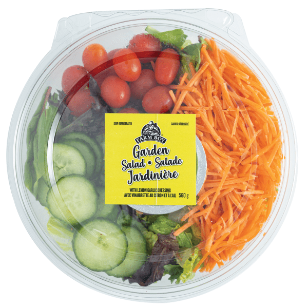 Fresh salad: Farm Boy™ Garden Salad. the salad has cherry tomatoes, shredded carrots, spring mix, and cucumber coins visible.