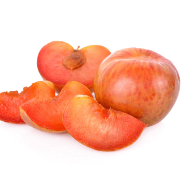 Sliced and whole pluots on white background.