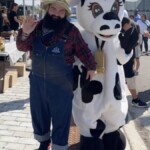 Farm Hand and Lulu the cow mascot.