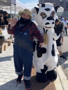 Farm Hand and Lulu the cow mascot.