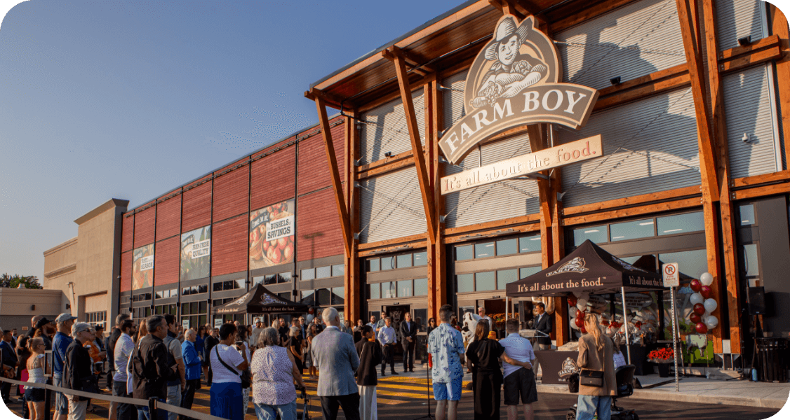 Large crowd of Farm Boy fans join an event outside a store.<br>