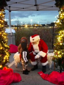 Santa asking children what they would like for Christmas. 