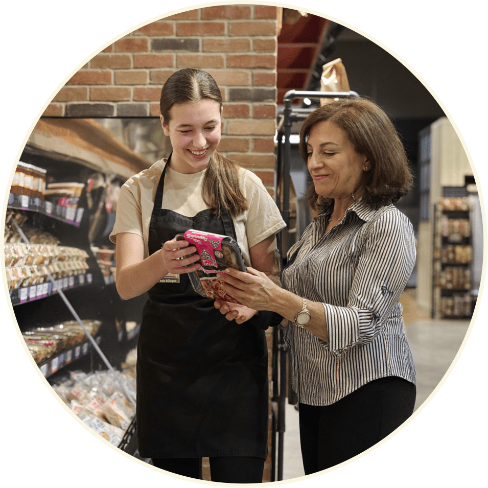 Farm Boy employee helping a customer